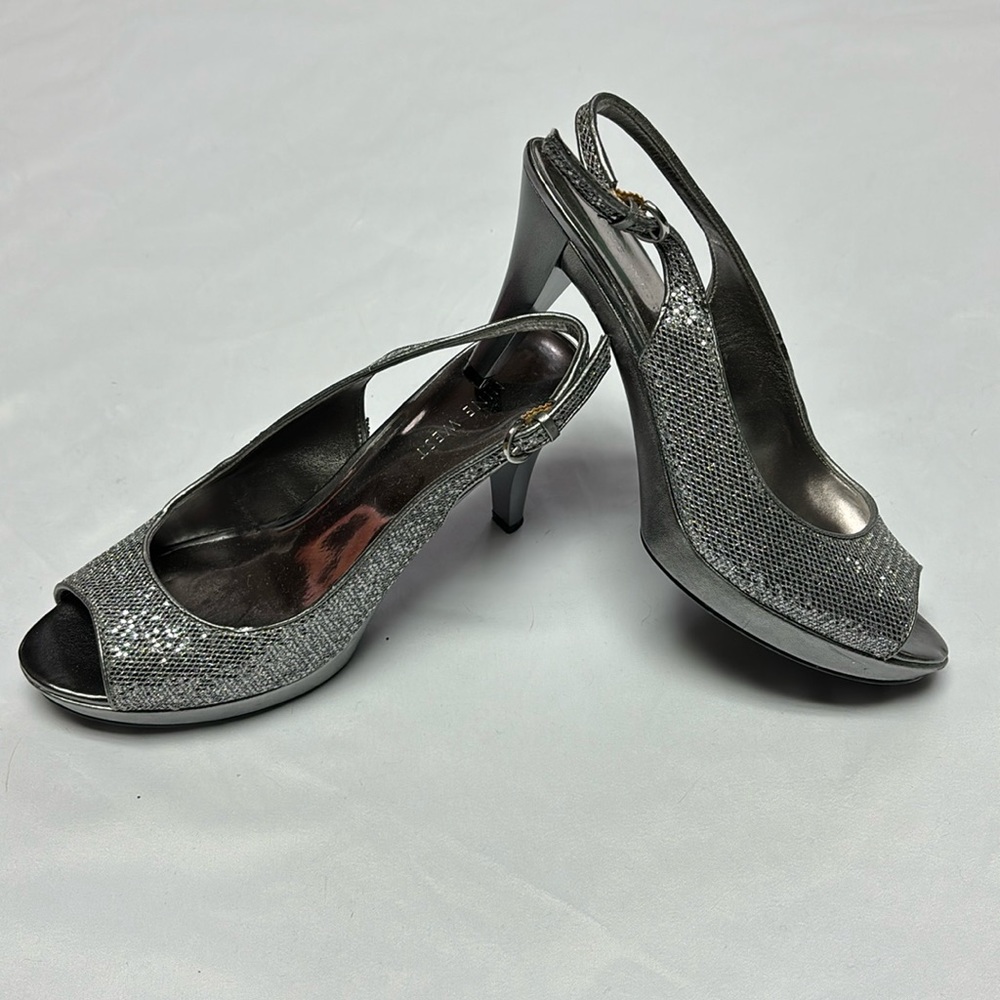 Nine West. Silver snakeskin peep toe slingbacks, size 6.5